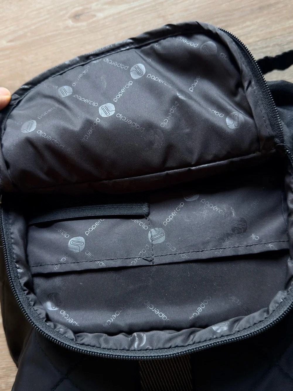 Black Quilted Roll-Top Backpack - [Brand]